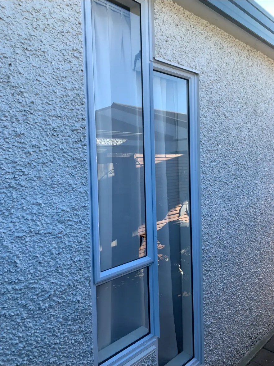 Streak-free tall exterior window pane in bright sunlight